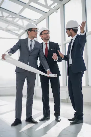 Group of architects discussing ideas for a new project photo with space for text